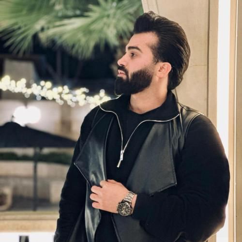 حسن گنجی با مرام